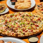 Philly Steak Pizza — juicy strips of steak, gooey cheese, and bold flavor — a bold twist from WiseGuys Pizza.