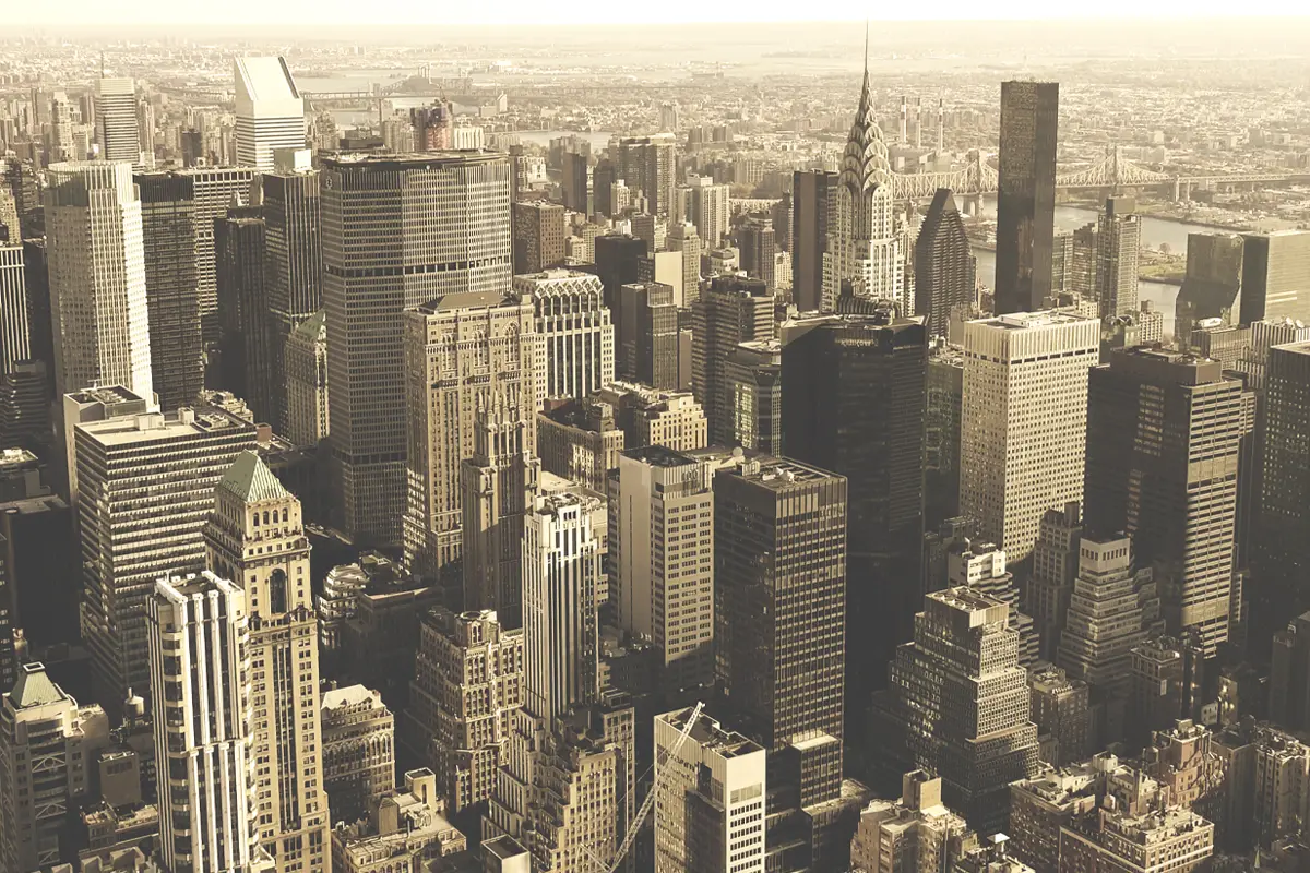 Vintage New York City skyline over water, historic style