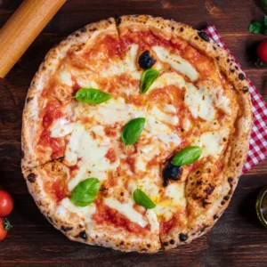 Wood-fired Margherita pizza from Wise Guys Pizzeria with fresh mozzarella, basil leaves, tomato sauce