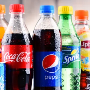 Assorted bottles of Coca-Cola, Pepsi, Sprite, and other refreshing drinks from Wise Guys Pizzeria in Florida